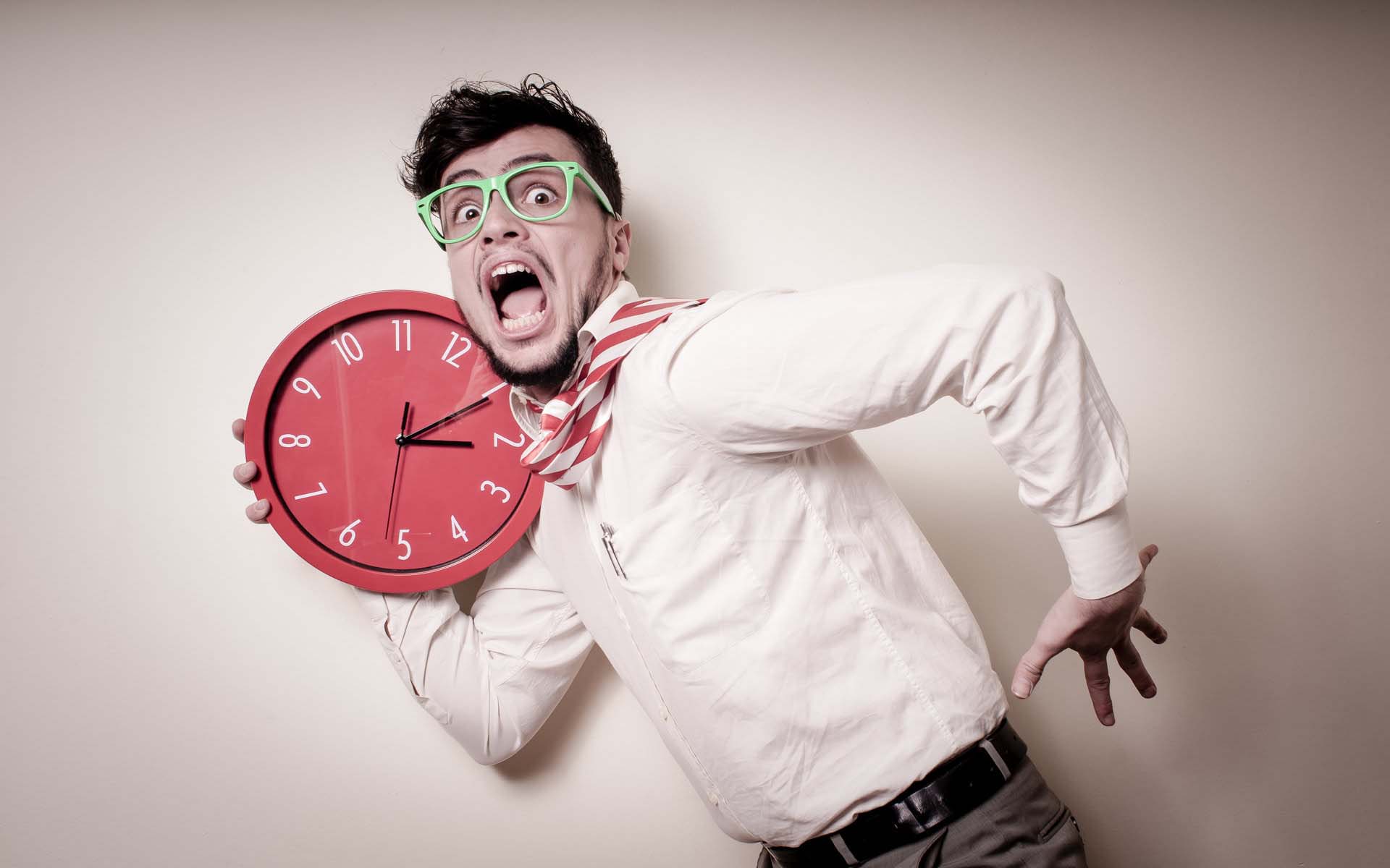 funny businessman with wall clock
